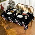 Detalle del mantel navideño de muñeco de nieve con estampados Let It Snow en comedor festivo - 90*140cm / Negro (XTC019)