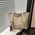Beige tote bag with M-letter jacquard and plush bunny charm on white table - No Pendant / White