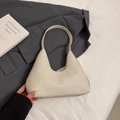 Minimalist beige woven tote bag with structural triangle design and wide shoulder strap - Beige