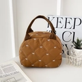 Brown quilted handbag with white bow embroidery and dark brown fabric handles - Brown