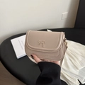Minimalist nude crossbody bag with a golden bow ornament and adjustable shoulder strap - Khaki
