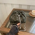Fashionable leopard print bucket bag with silver chain and pearl drawstring closure - Green