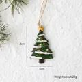 Resin Christmas tree hanging ornament with snow details and twine loop, 8cm height - Star Christmas Tree