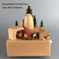 Handcrafted wooden Christmas music box with rotating train and festive scenery - Natural Wood Christmas Train (1532A)