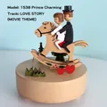 Wooden music box with Prince Charming and Love Story tune featuring couple on a rocking horse - Prince Charming (1538)