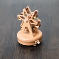 Handmade wooden Ferris wheel music box in natural wood finish with manual toggle switch - Round Base Ferris Wheel (1501)