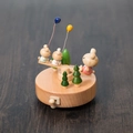 Handcrafted wooden music box with forest bears on a seesaw and colorful balloons - Seesaw (1509)