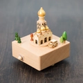 Handcrafted wooden music box with miniature architectural scene and small car on wood surface - Church (1507)
