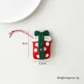 Petit sac cadeau de Noël en feutre rouge à pois avec un nœud décoratif vert - Boîte Cadeau / Rouge