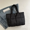 Fashionable black quilted puffer tote bag with glossy nylon finish and square stitching - Black