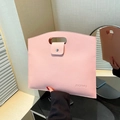 Pink minimalist handbag in pebble leather with top handle and metal buckle closure - Pink