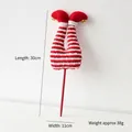 Christmas elf leg stakes in red and white stripes with gold bells for tree decor - Striped Elf Legs