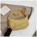 Detail of yellow tote bag featuring a unique bubble pleated texture and hobo design - Yellow