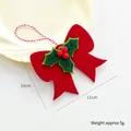 Christmas bow ornament in red and green felt with holly leaves and white string - Three-leaf Bow