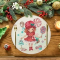 Round linen placemat with Christmas girl illustration on dark wooden tabletop - Christmas Girl Illustration Style (XRP034)