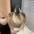 Minimalist beige canvas tote bag with textured finish and wide shoulder strap - Khaki