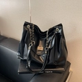 Large black tote bag in glossy leather with gold chain strap and twist-lock pocket - Black