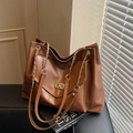 Large vintage brown chain tote bag with gold swivel lock and glossy leather finish - Brown