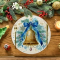 Round Christmas placemat with golden bell design on a wooden table with cutlery - Christmas Bells and Flowers Style (XRP037)
