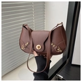 Detail of dark brown leather underarm bag with gold metal twist lock and rivets - Brown