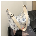 Detail of white striped canvas crescent bag featuring blue bows and cute bear illustration - Blue and White Striped Bear Print