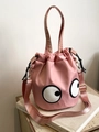 Bolso tipo cubo rosa de nailon con diseño de ojos de dibujos y correa ajustable - Rosa