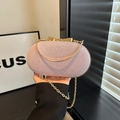 Clutch da sera rosa glitterata con chiusura a fiocco dorato e tracolla a catena - Rosa
