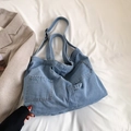 Sac fourre-tout en jean bleu clair avec plusieurs poches et bandoulières sur tissu - Bleu