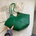 Chic green woven leather tote bag with wide cross-weave design and long shoulder straps - Green
