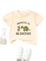 Detail of baby t-shirt featuring Big Brother dinosaur print with rib-knit neckline - 90cm / Apricot (D018)