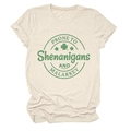 Detail of shamrock graphic and lettering on a beige crew neck short sleeve cotton T-shirt - Sand