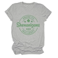 Detailed view of grey crew neck t-shirt with green retro St. Patrick's Day graphic - Light Gray