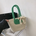 Handwoven straw tote bag in beige with vibrant green handles and a white lace bow detail - With Silk Scarf / Green