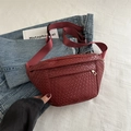 Burgundy woven leather waist bag with wide adjustable nylon strap and metal zipper - Red