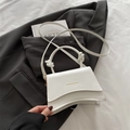 Piccola borsa a mano bianca con manico annodato e tracolla sottile rimovibile - Bianco
