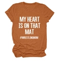 Close-up of rust red cotton t-shirt with white MY HEART IS ON THAT MAT printed text - S / White Font / Burnt Orange