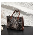 Large capacity tote bag featuring leopard print pattern and brown leather straps - Brown