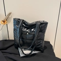 Black padded down tote bag with square quilting and gold button detail for women - Black