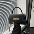 Matte black leather underarm bag with gold chain lock and top handle for women - Black
