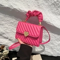 Pink quilted crossbody bag with golden heart clasp and ruffled cloud handle - Rose Red