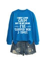 Flat lay of royal blue crewneck sweatshirt with white text and distressed denim shorts - Lake Blue (White Print)
