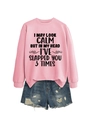 Detail of pink crewneck sweatshirt with black English slogan paired with ripped denim shorts - Pink (Black Print)