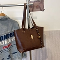 Retro dark brown leather tote bag with gold metal clasp and bell pendant charm - With Pendant / Brown