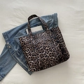 Stylish large leopard print canvas tote bag with wide handles for autumn daily commute - Brown