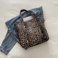 Large capacity leopard print tote bag with thick canvas texture on casual denim jacket - Brown