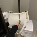 Minimalist white leather underarm bag with gold metal buckle and chain strap detail - White