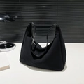 Bolso hobo minimalista de lona negra con asas de cuero y cremallera metálica plateada - Negro