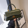Deep green vintage oil wax leather crossbody bag with round handle and gold hardware - With Pendant / Green