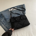 Chic black quilted crossbody bag with acrylic chain handle and gold hardware detail - Black