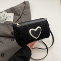 Chic black plush cylinder bag with a heart patch and sleek leather shoulder strap - Black